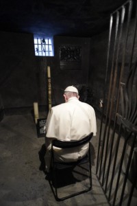 Pope Francis praying in St Maximilian Kolbe's cell in Auschwitz
